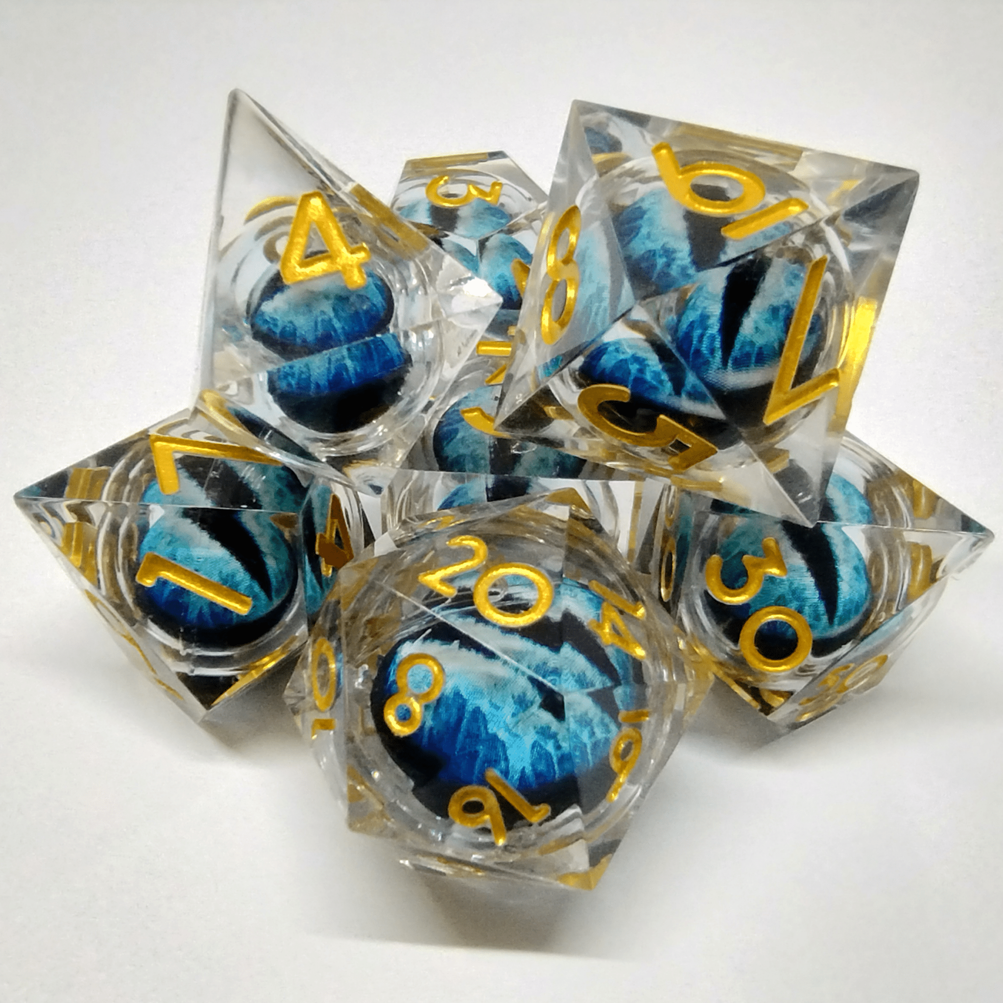 Liquid Core Blue Dragon Eye Sharp Edge 7 Piece Dice Set image 0